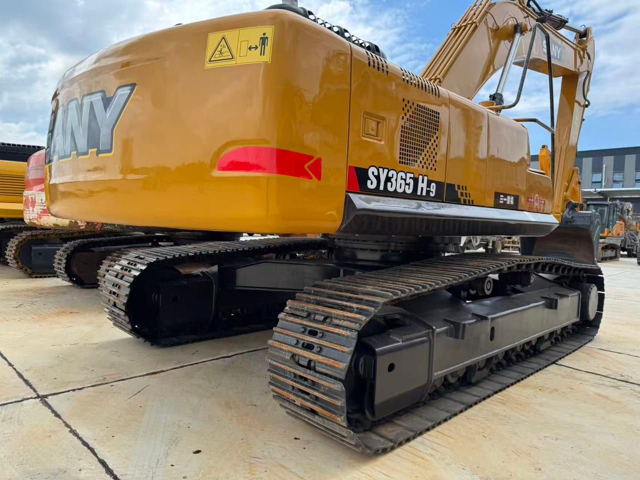 SANY SY365H-9 from the rear three-quarter, the counterweight carrying the SY365H-9 badge and the long track frame